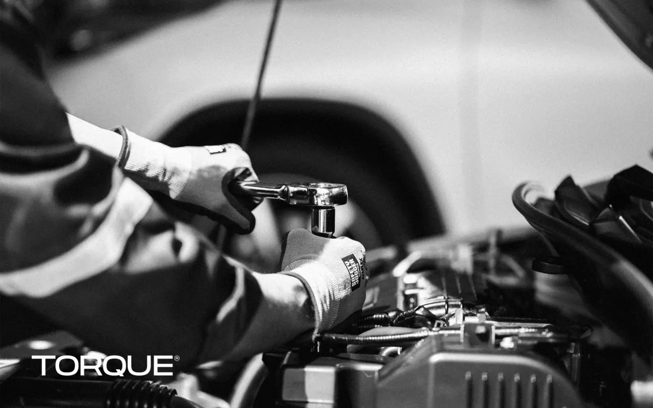 TORQUE Soluções Automotivas — aplicação 12 da identidade visual